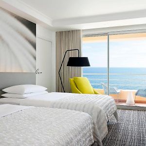 Premium Double Room Two Double Beds Balcony Partial Sea View